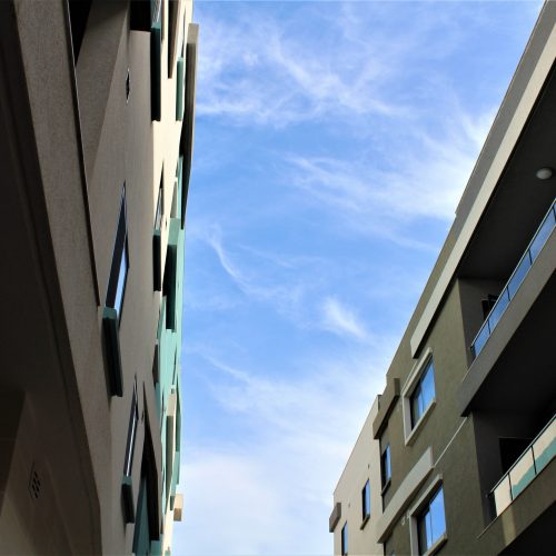 Glass balconies and aluminum windows and doors